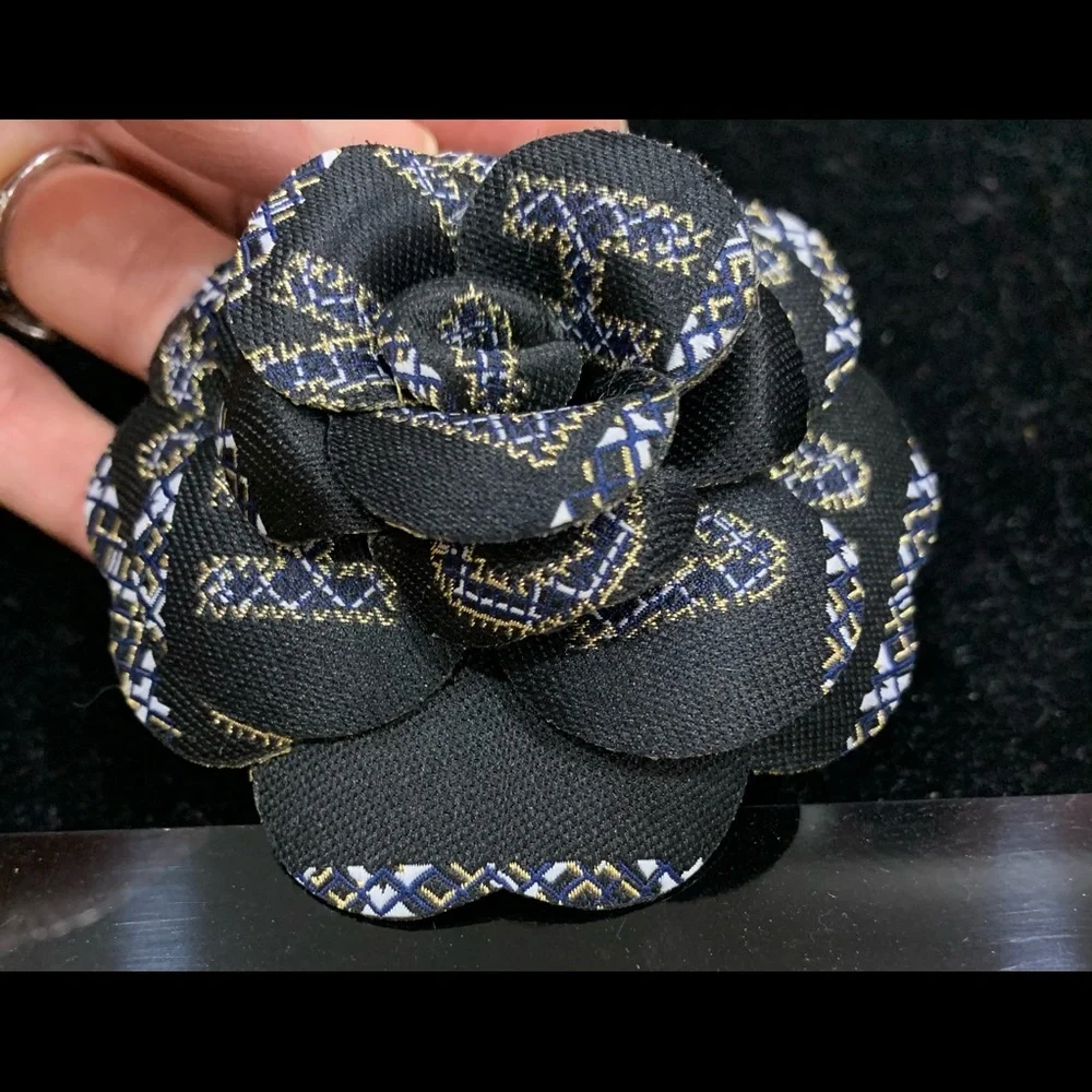 CHANEL Black Camellia Flower Brooch with Gold & Blue Stitching